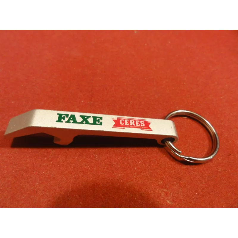 1 PORTE CLE DECAPSULATEUR  FAXE CERES