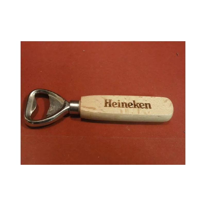 1 DECAPSULEUR  HEINEKEN