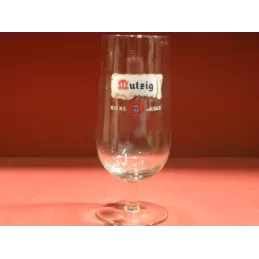 1 VERRE MUTZIG 50CL  YEUX BLANCS  HT. 19.60CM