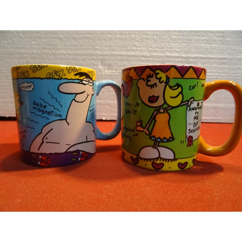 DEUX MUGS SEXIEST MAN ET WOMAN HT. 9CM