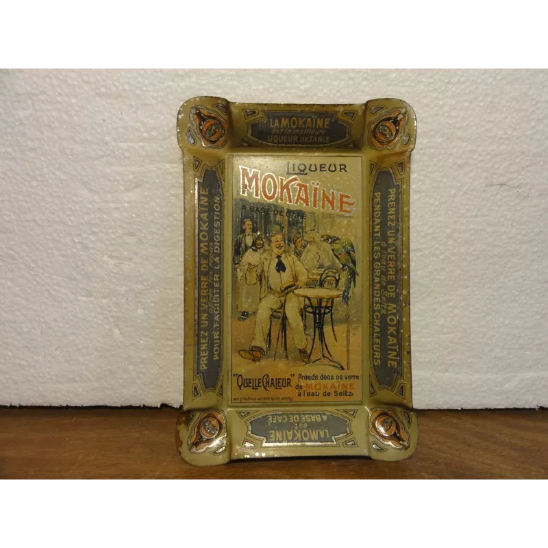 CENDRIER EN TOLE LITHO  LIQUEUR  MOKAINE 12CM X7.50CM