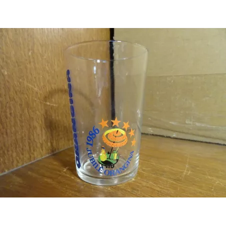 1 VERRE ORANGINA JUBILE 1986 HT 9.70CM