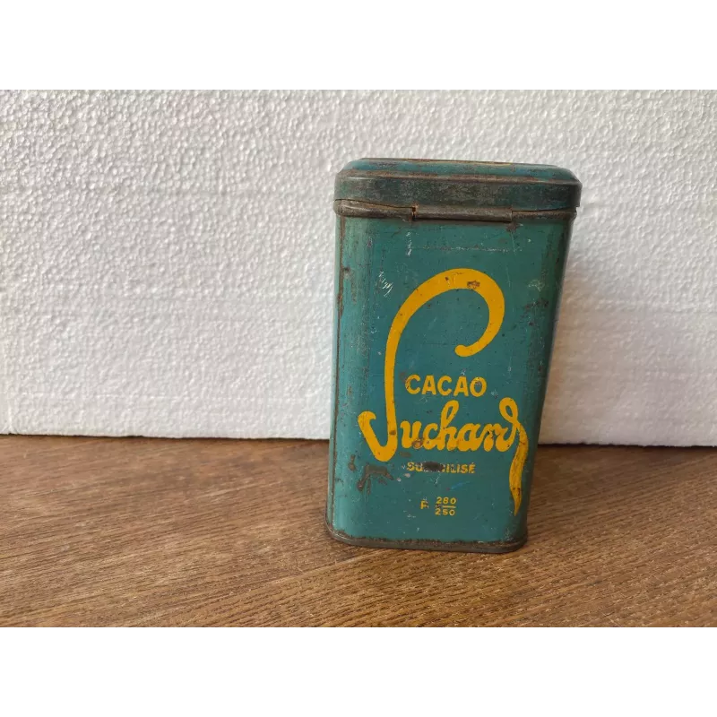 BOITE CACAO SUCHARD 7.40CM X7.40CM HT 12.50CM BOITE CACAO SUCHARD 7.40CM X7.40CM HT 12.50CM