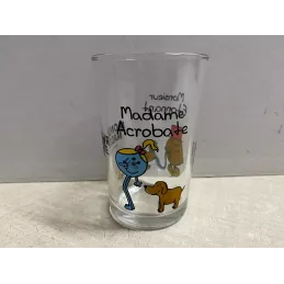 1 VERRE MOUTARDE  MADAME  ACROBATE -MONSIEUR  ETONNANT  HT 9.80CM